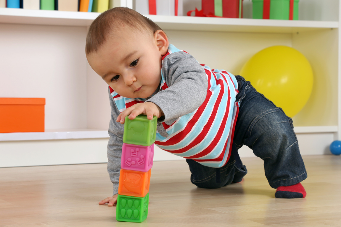 Baby playing with cubes